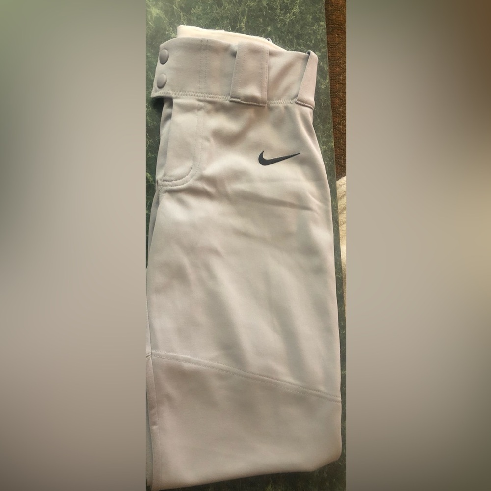 Nike boys Light Gray athletic pants Black Swoosh